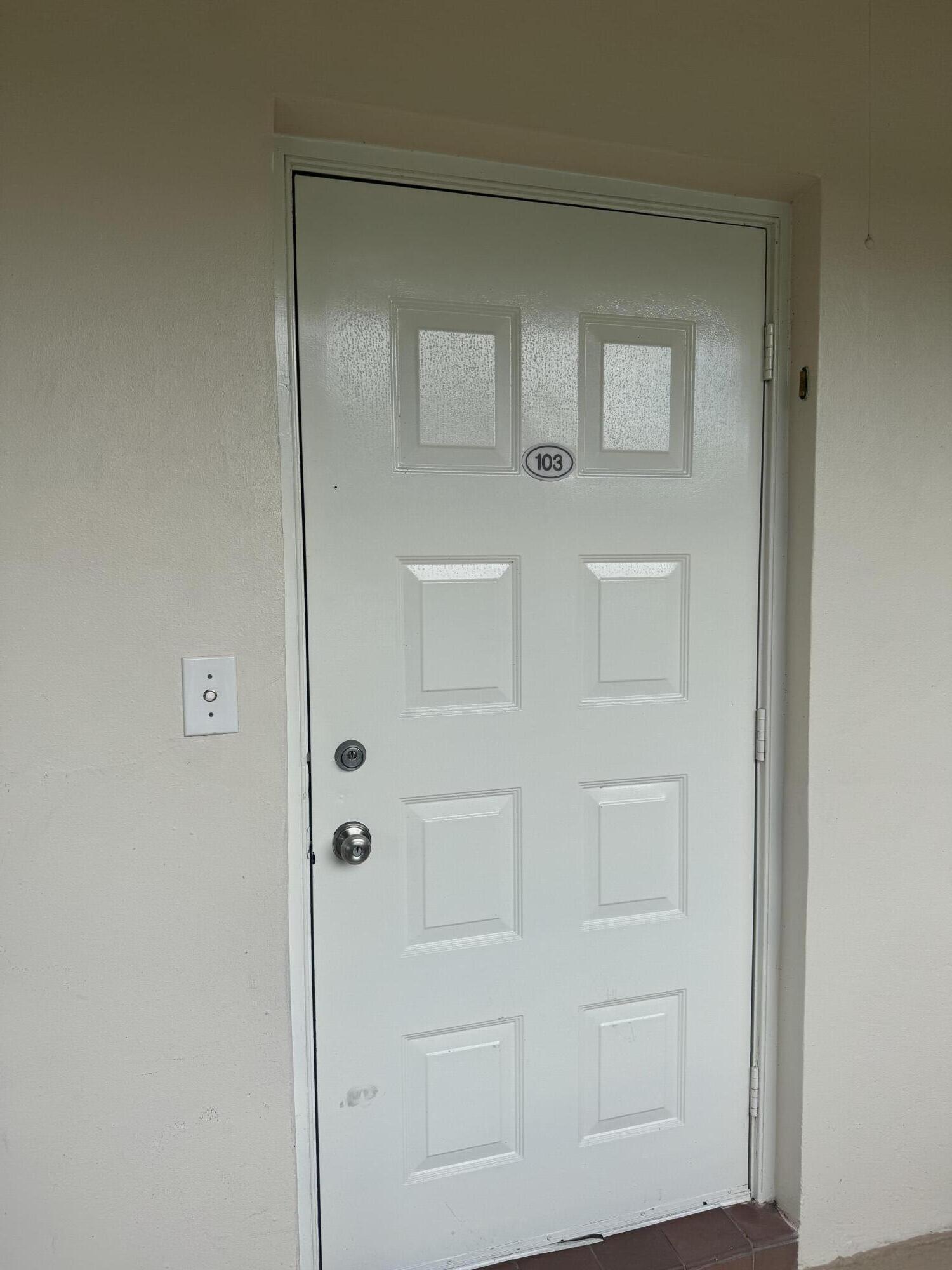 a view of a hallway with closet area