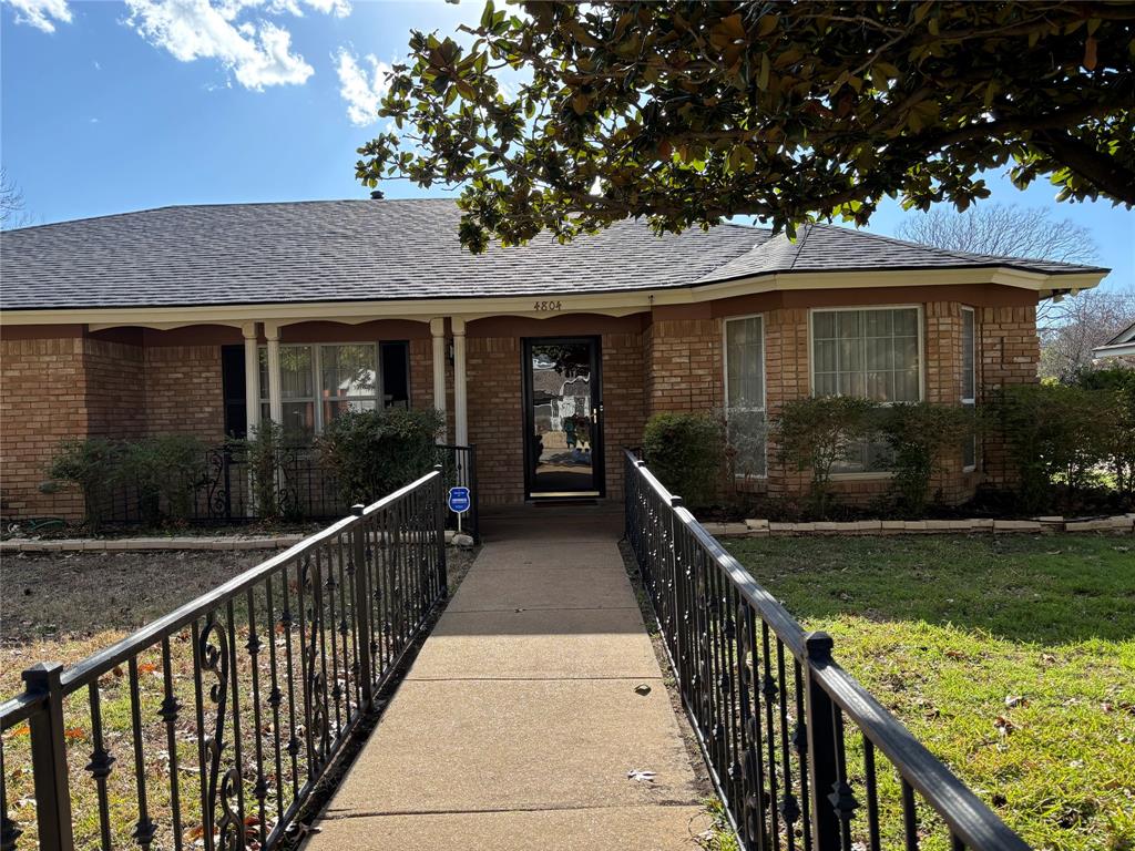 Front of house with NEW ROOF