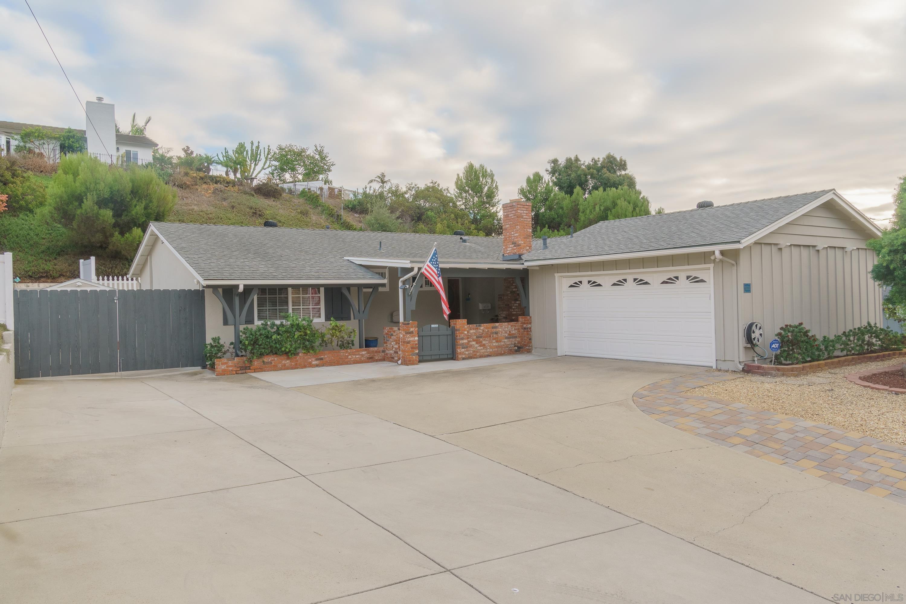 front view of a house with a patio