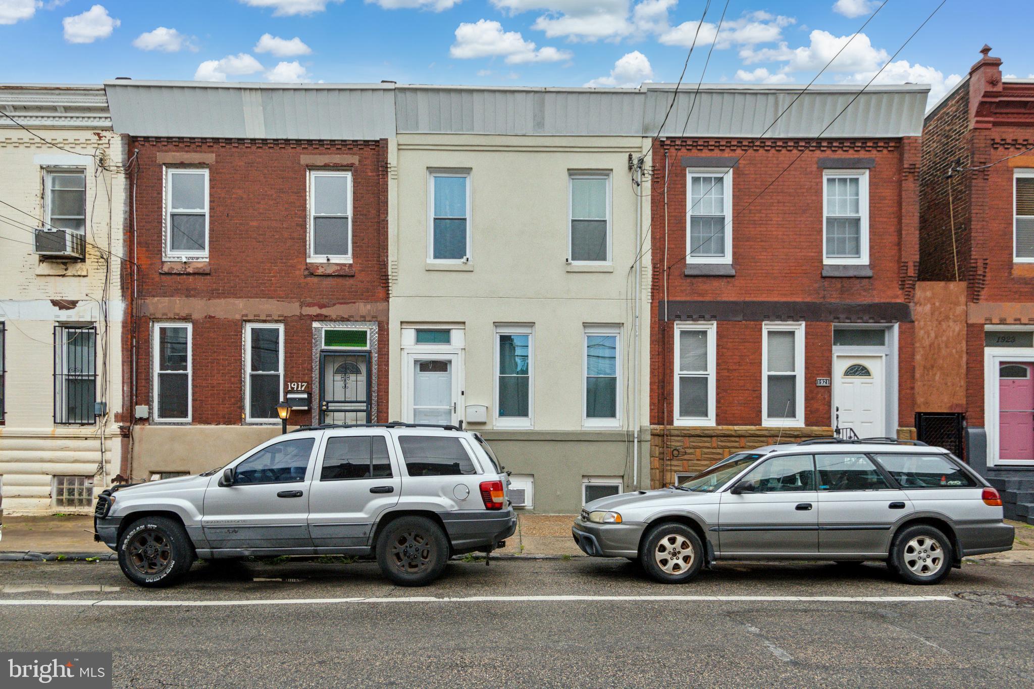 a car parked in front of a building