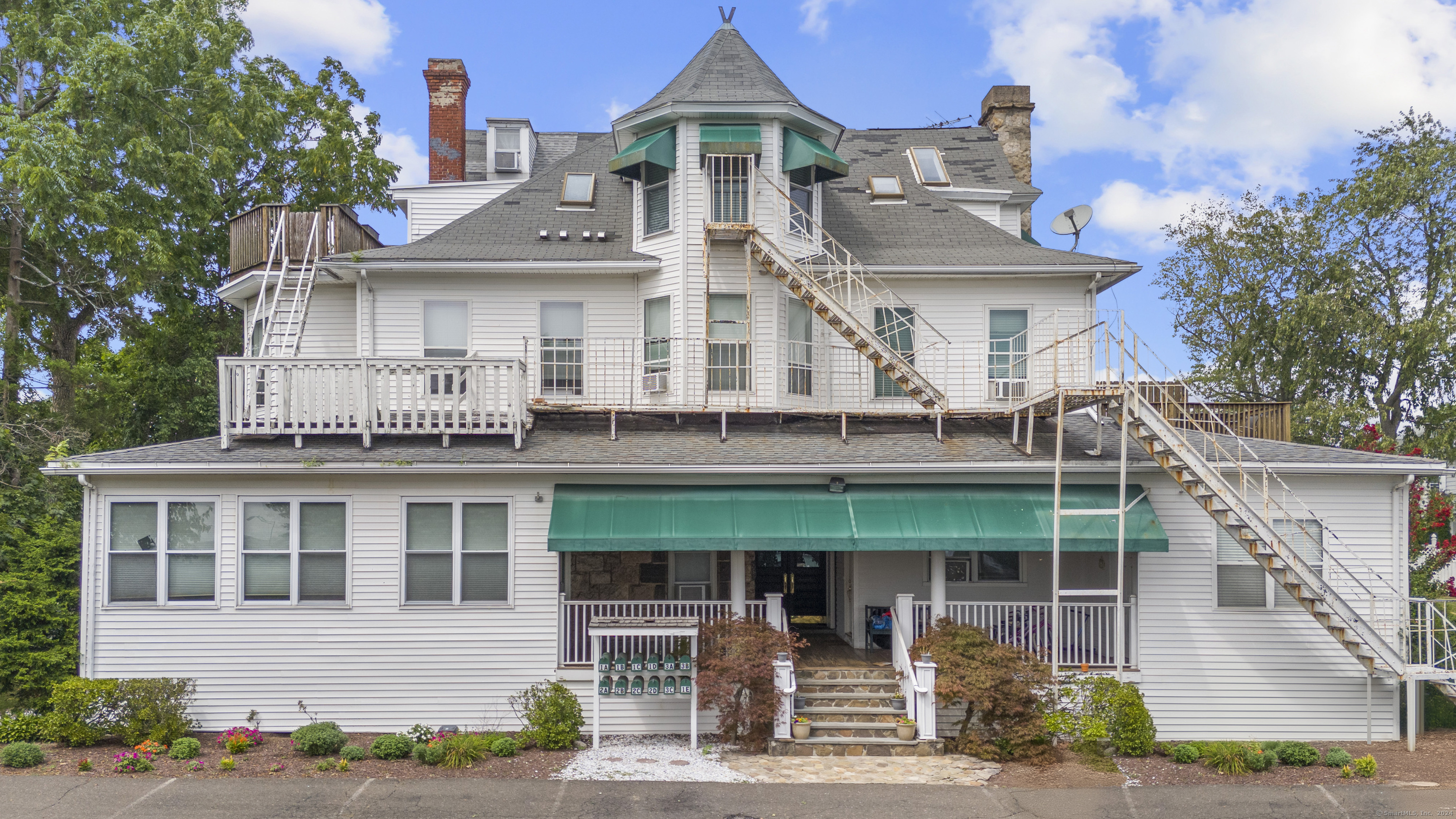 a front view of a house with balcony