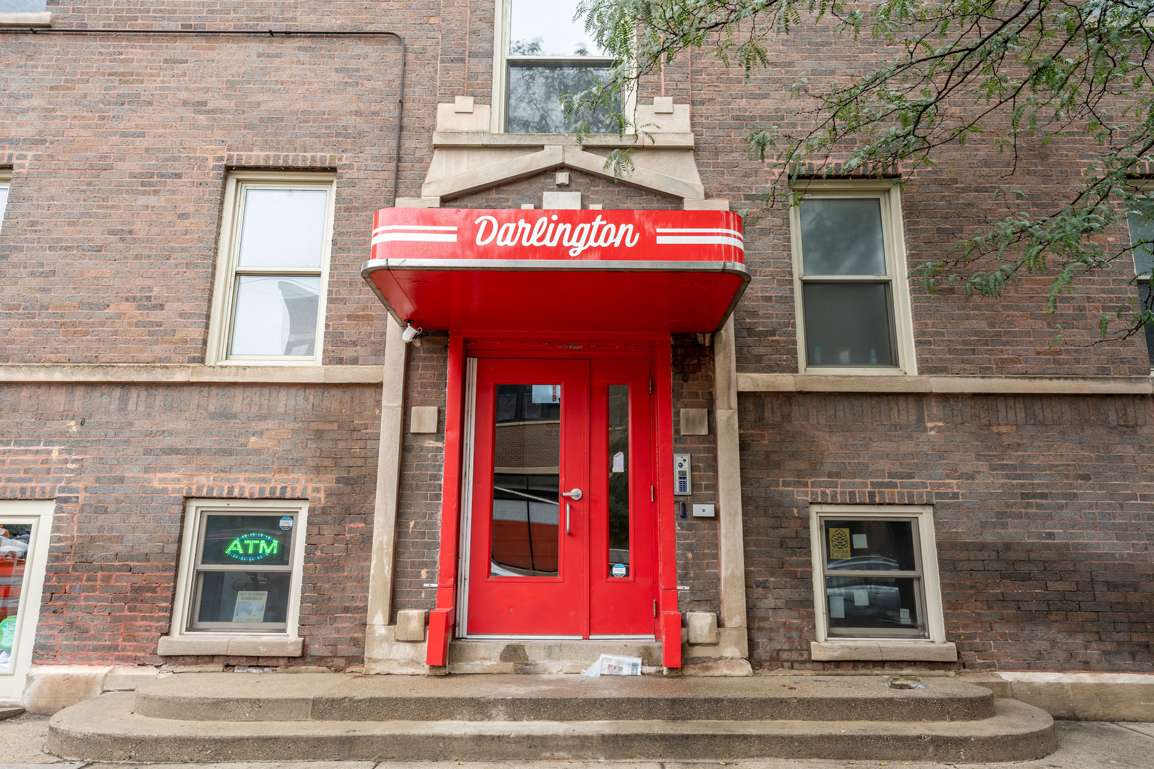 a view of a brick building with a entrance