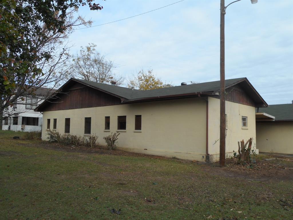 a house with trees in the background