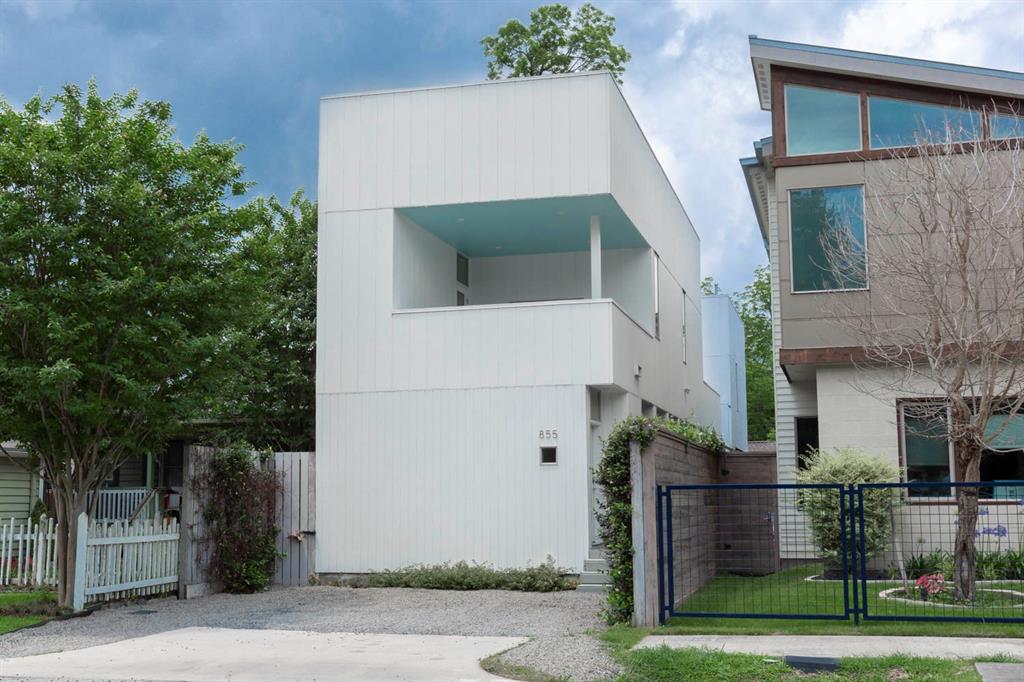 front view of a house with a small yard