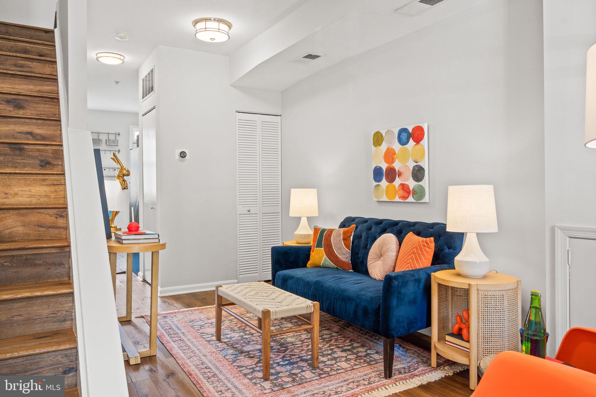 a living room with furniture and a couch