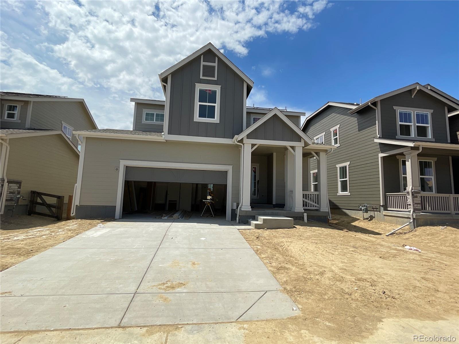 a front view of a house with yard