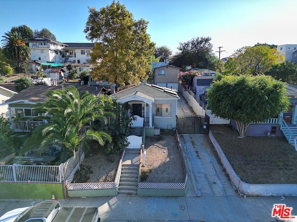 a view of house with outdoor space