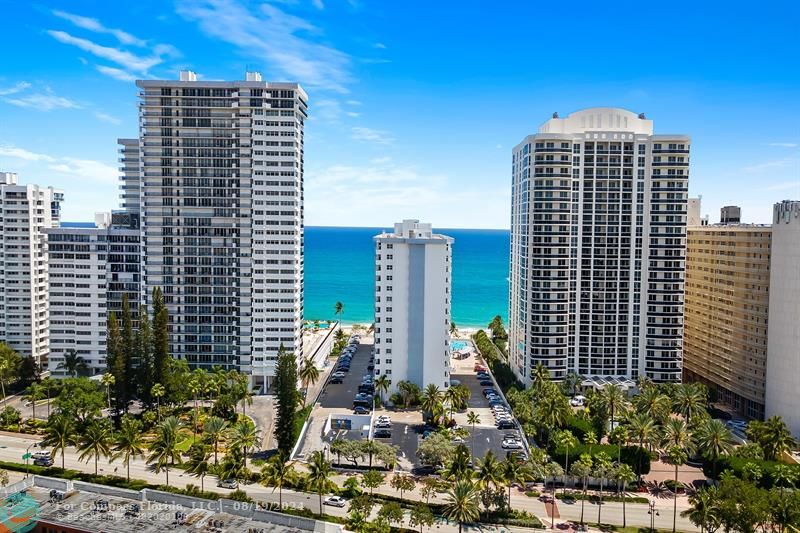 a view of a city with tall buildings