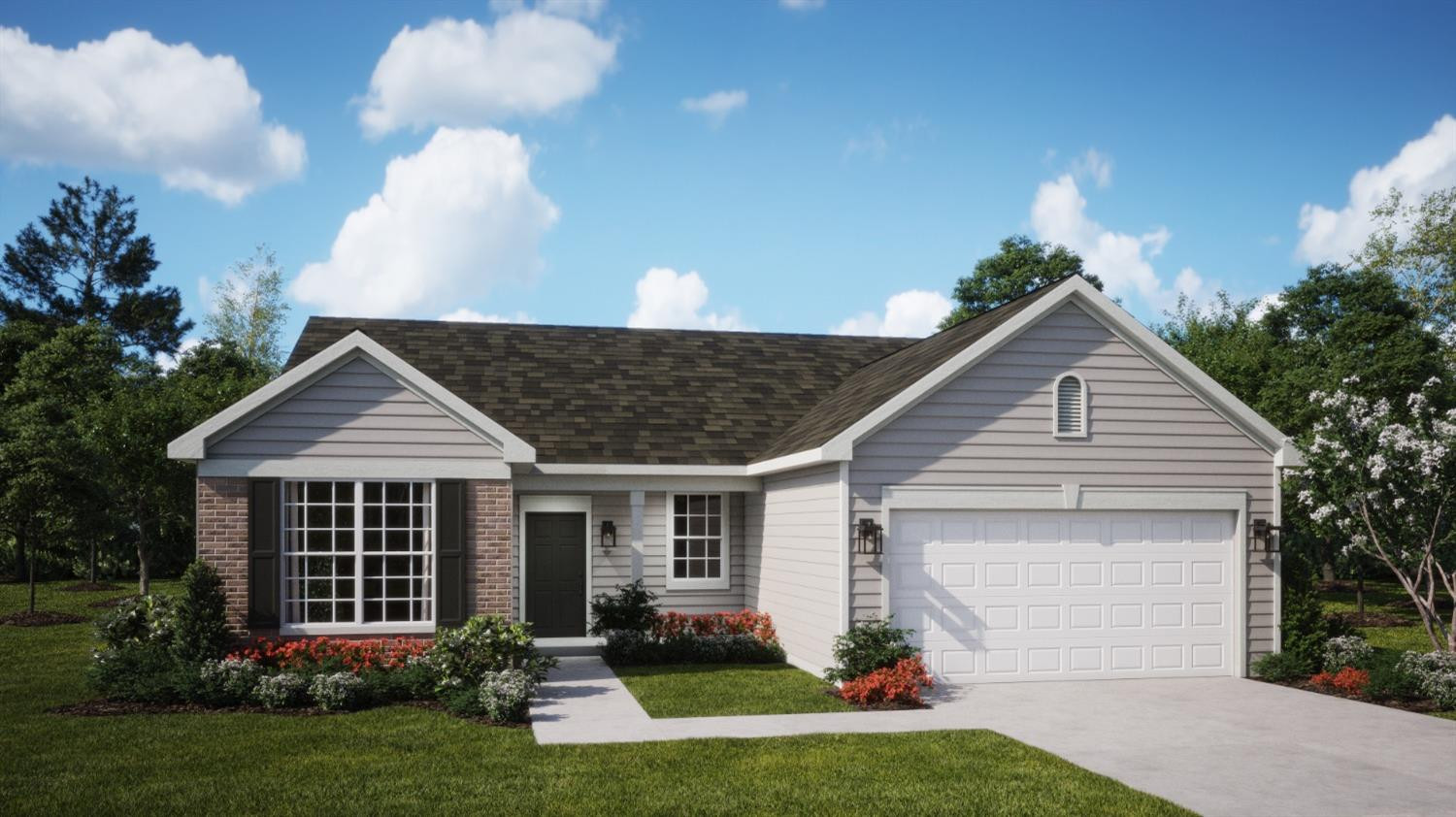 a front view of a house with a yard and trees