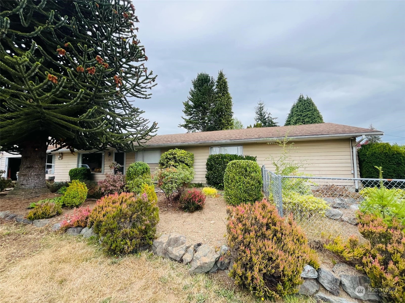 front view of a house with a yard