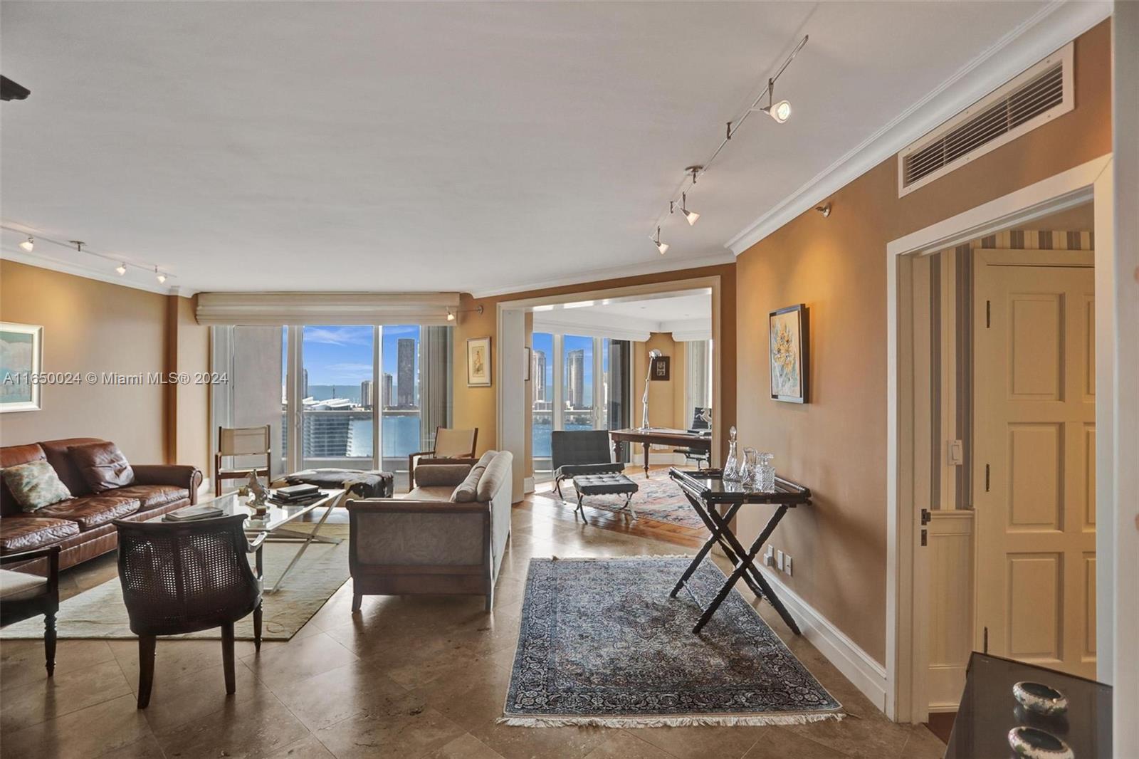 a view of a livingroom with furniture and a table