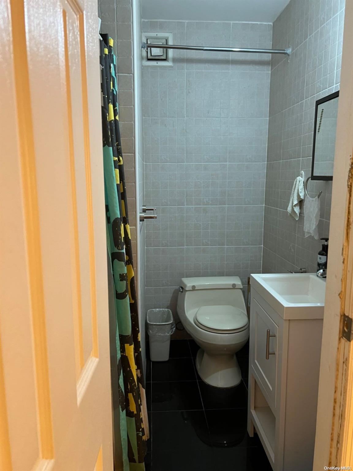 a bathroom with a sink and toilet