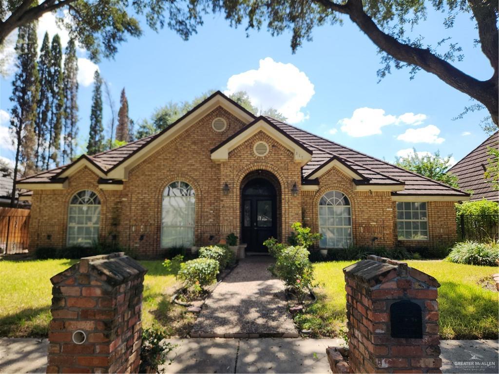 View of front of property with a front yard