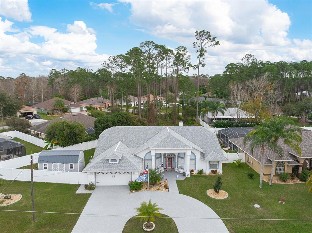 a aerial view of a house with a garden