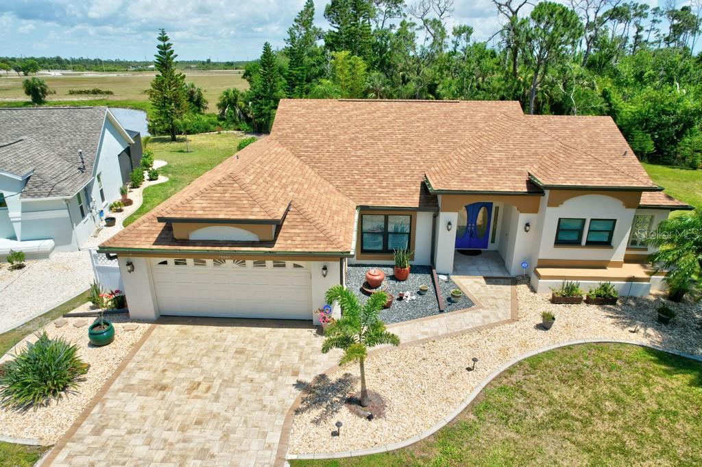 aerial view of a house with a swimming pool