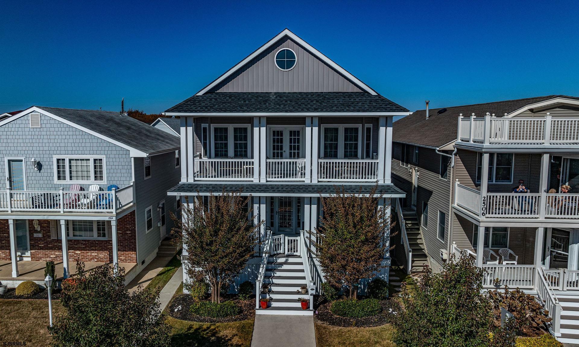 a front view of a house with yard