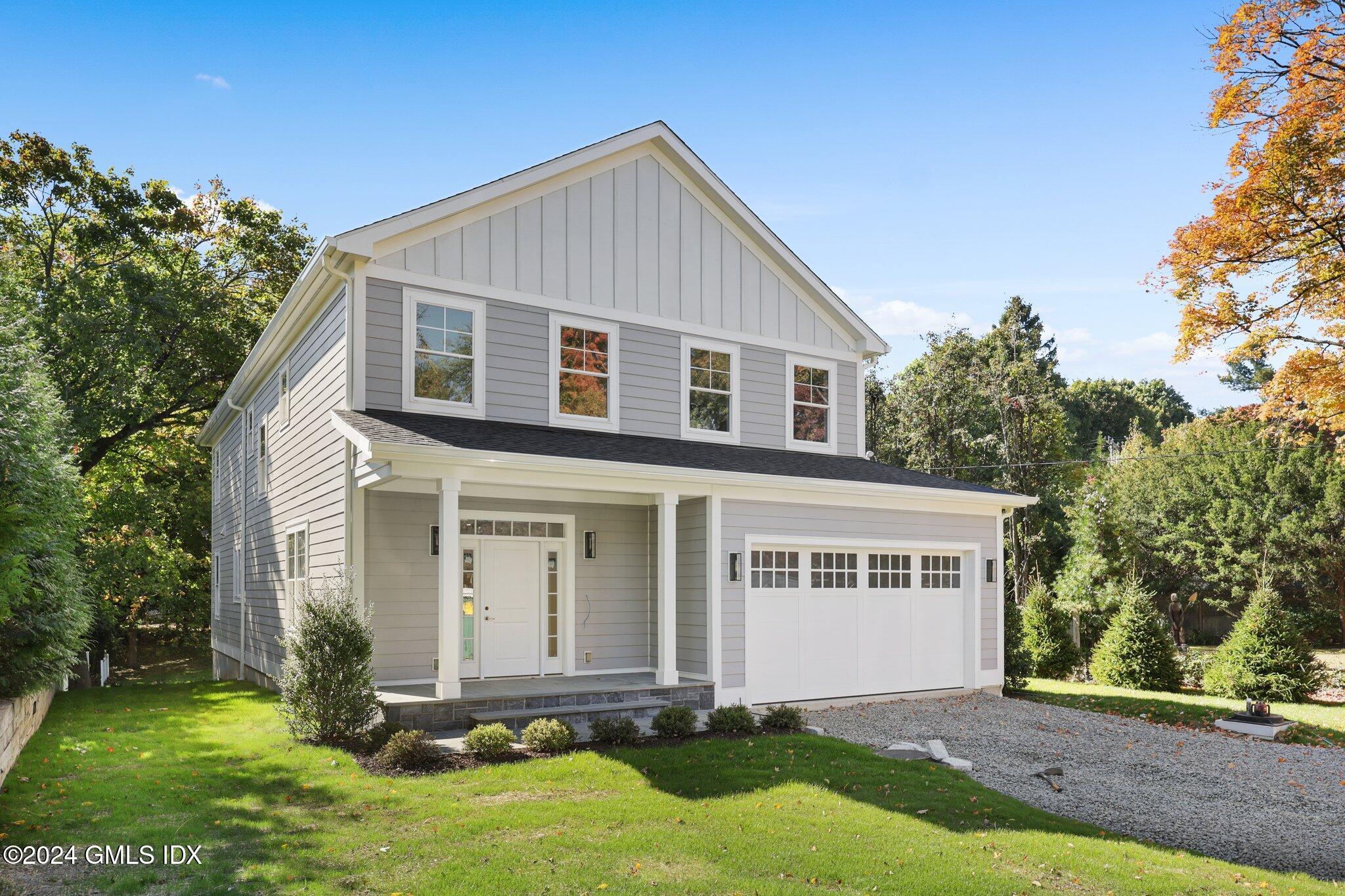 front view of house with a yard