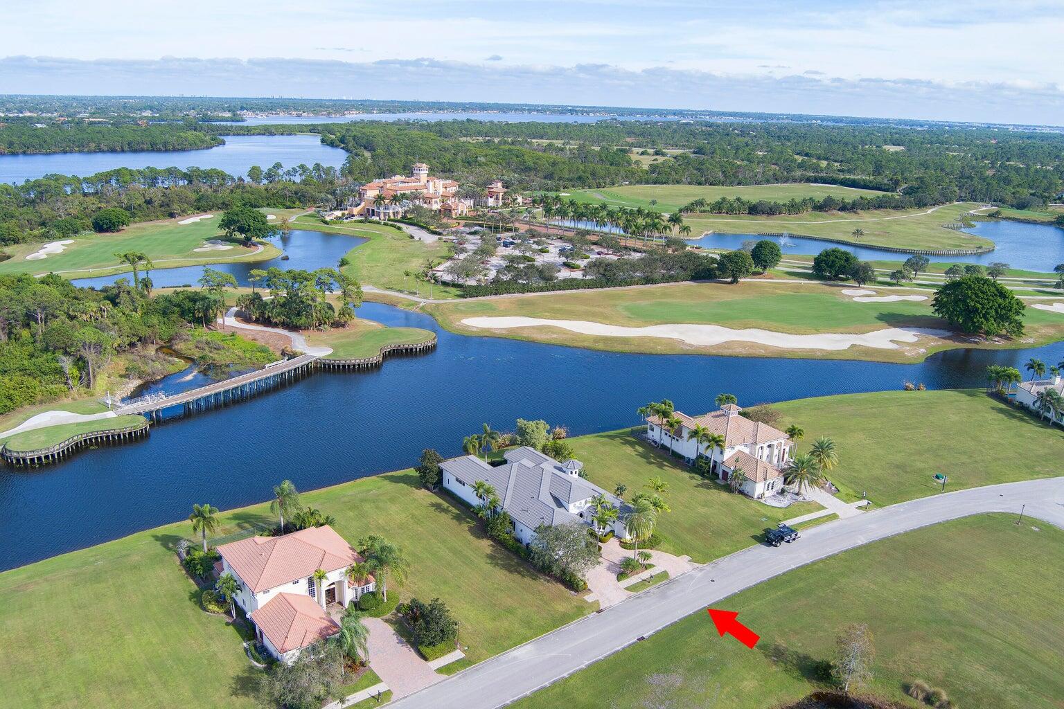 an aerial view of a house with a ocean view