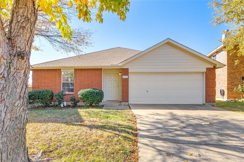 Single story home with a garage