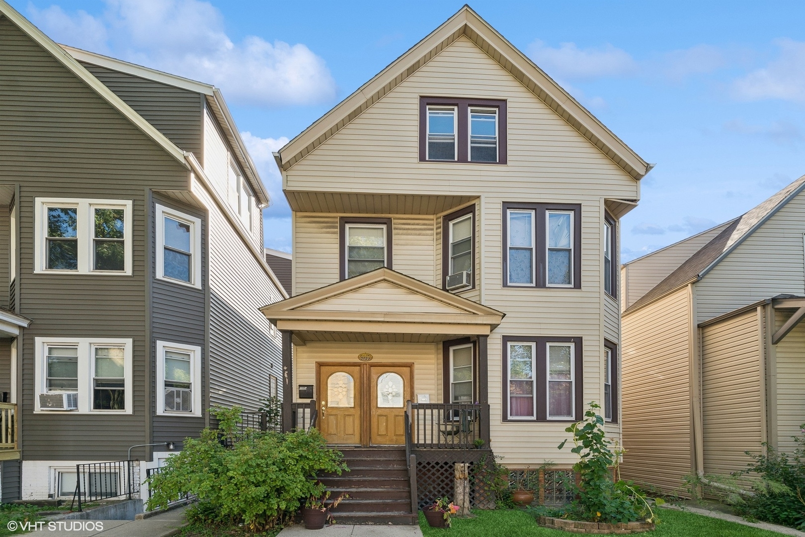 a front view of a house with a yard