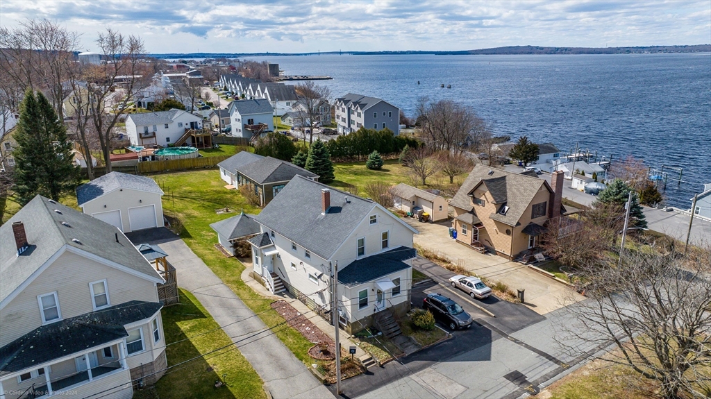 an aerial view of a house with a garden