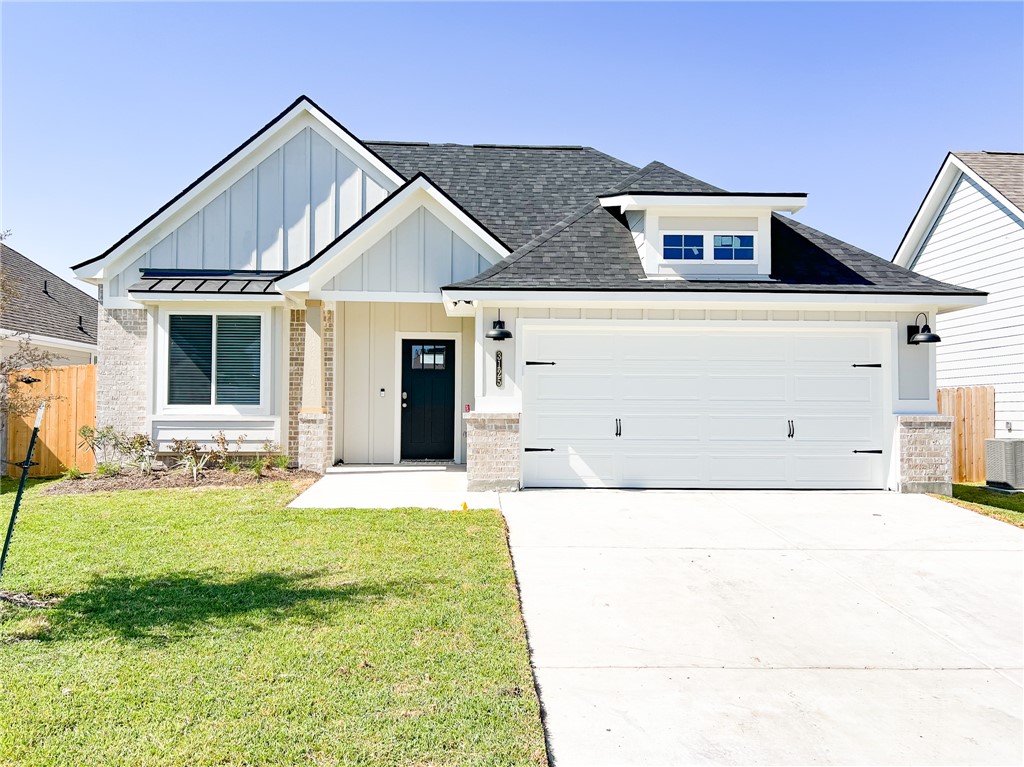 a view of house with yard