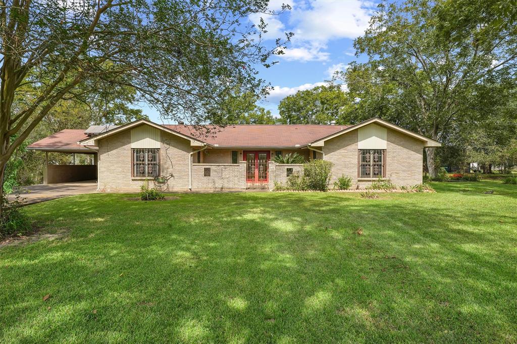 Beautiful one story brick Spanish / Ranch style home on ONE acre.