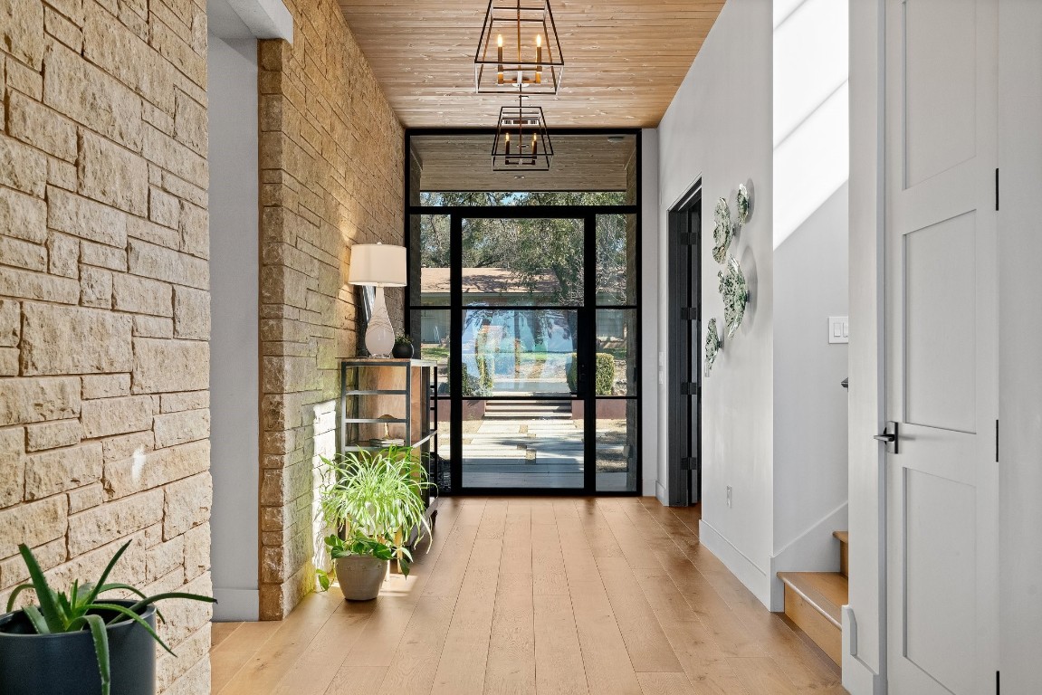 a view of entryway with wooden floor