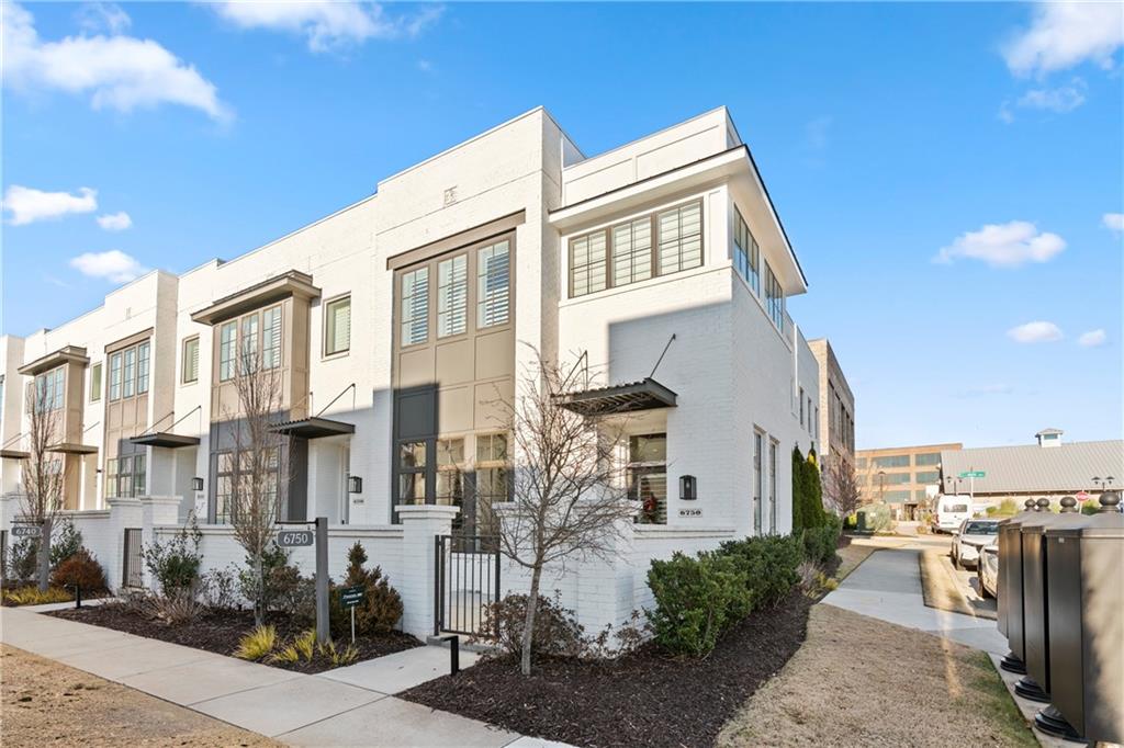 a view of a front door and outdoor space