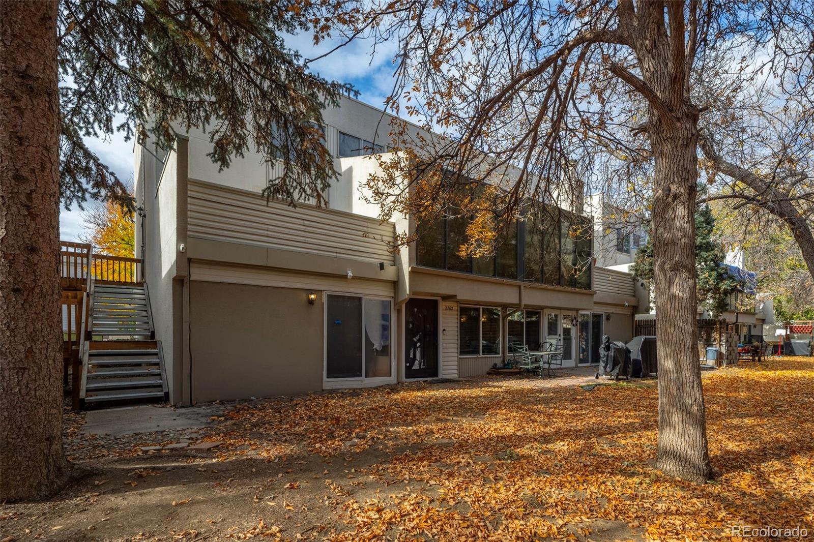 a house with trees in front of it