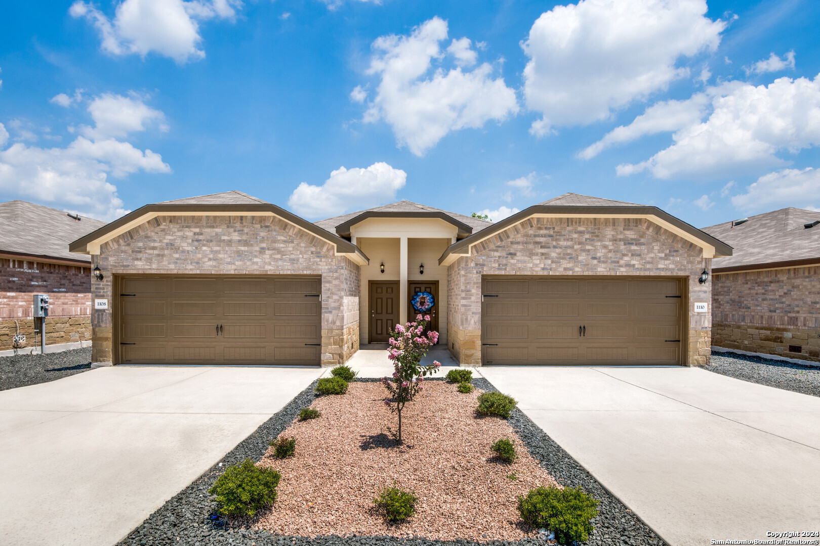 a view of a house with a pathway