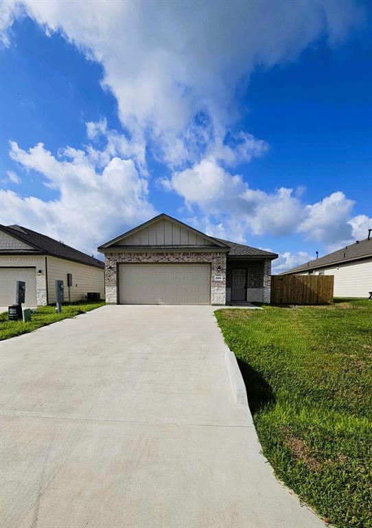 a house with yard in front of it