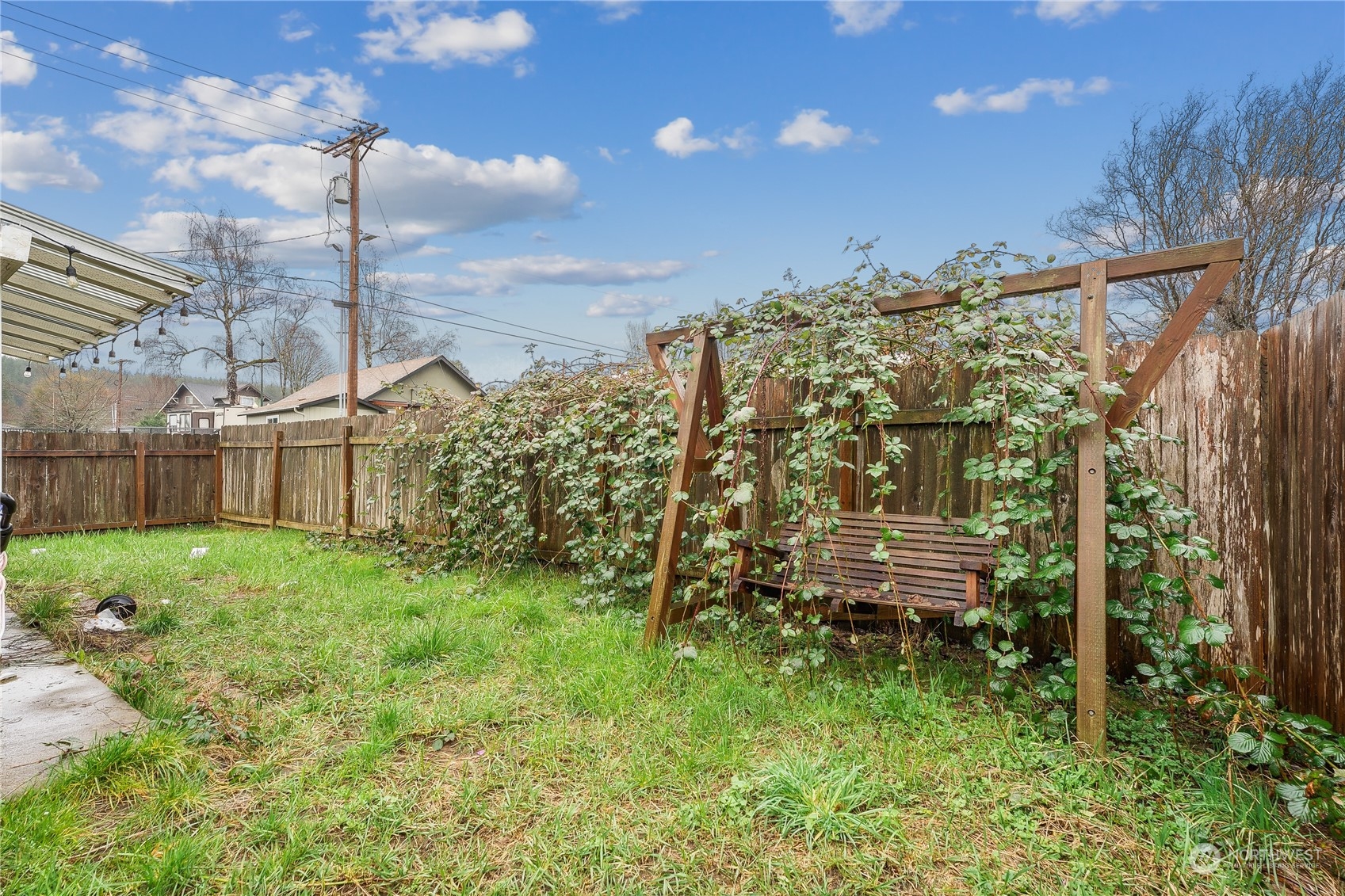 a backyard of a house with lots of green space