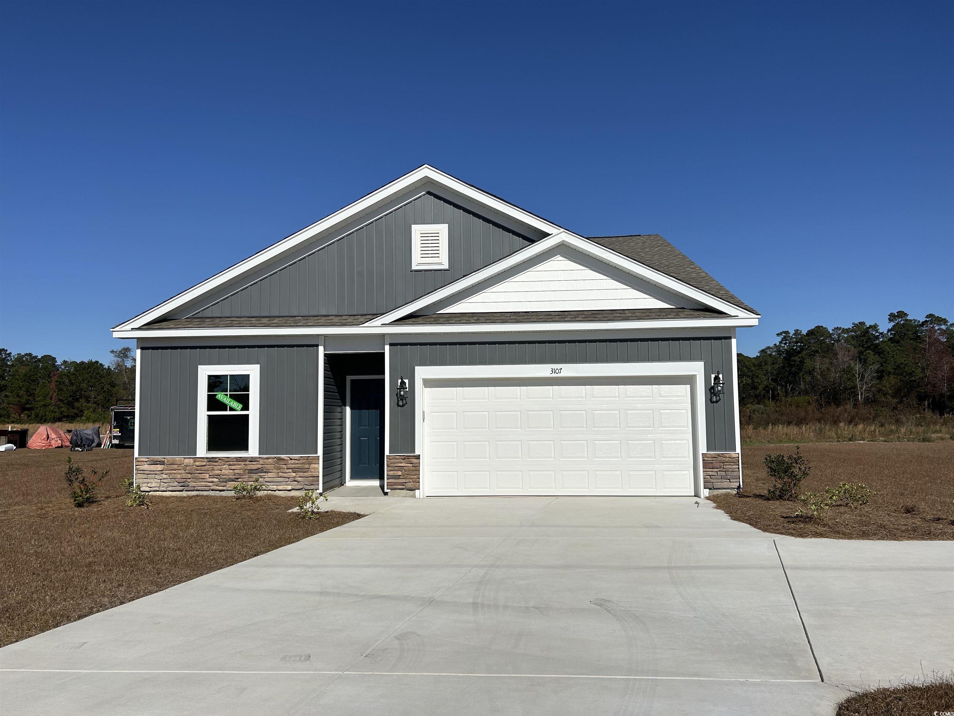 Craftsman-style home with a garage