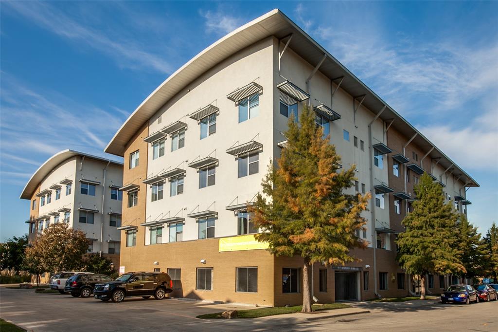 a view of a building and a street