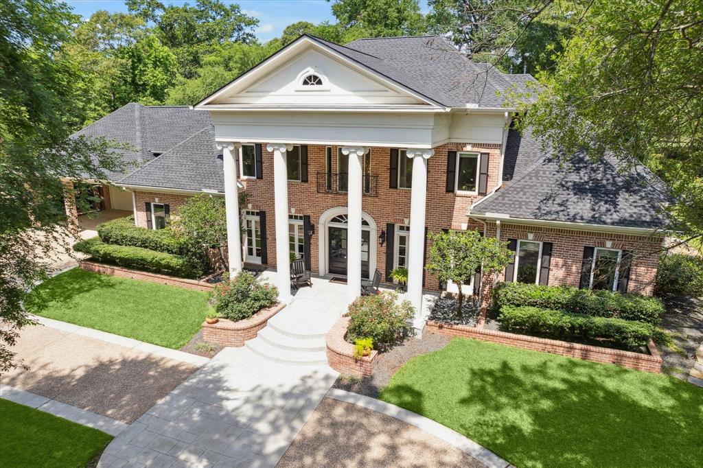 This exquisite custom estate is located on almost an acre of land in the heart of The Woodlands on the 8th tee box of the Deacon Golf Course at the flagship location of the prestigious Woodlands Country Club.