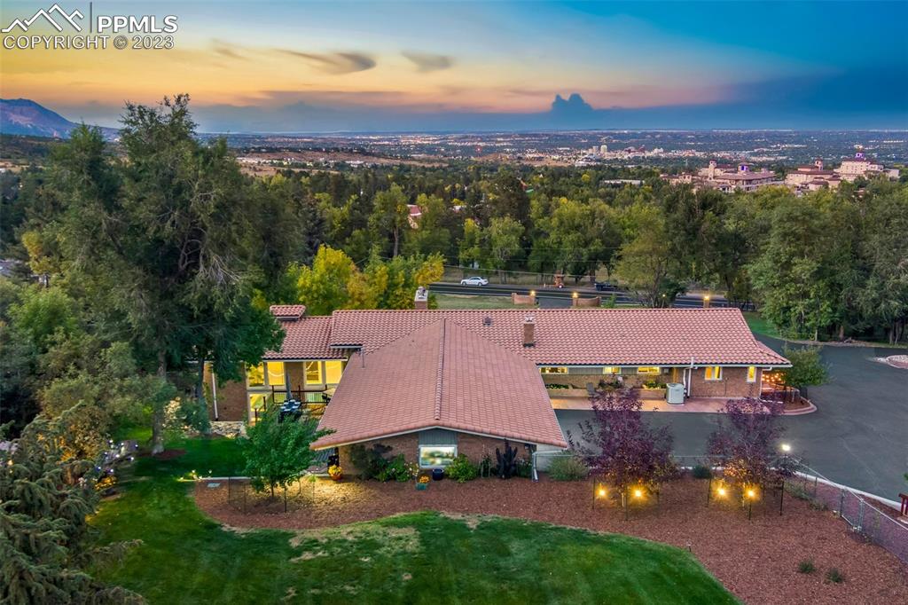 an aerial view of a house with a garden