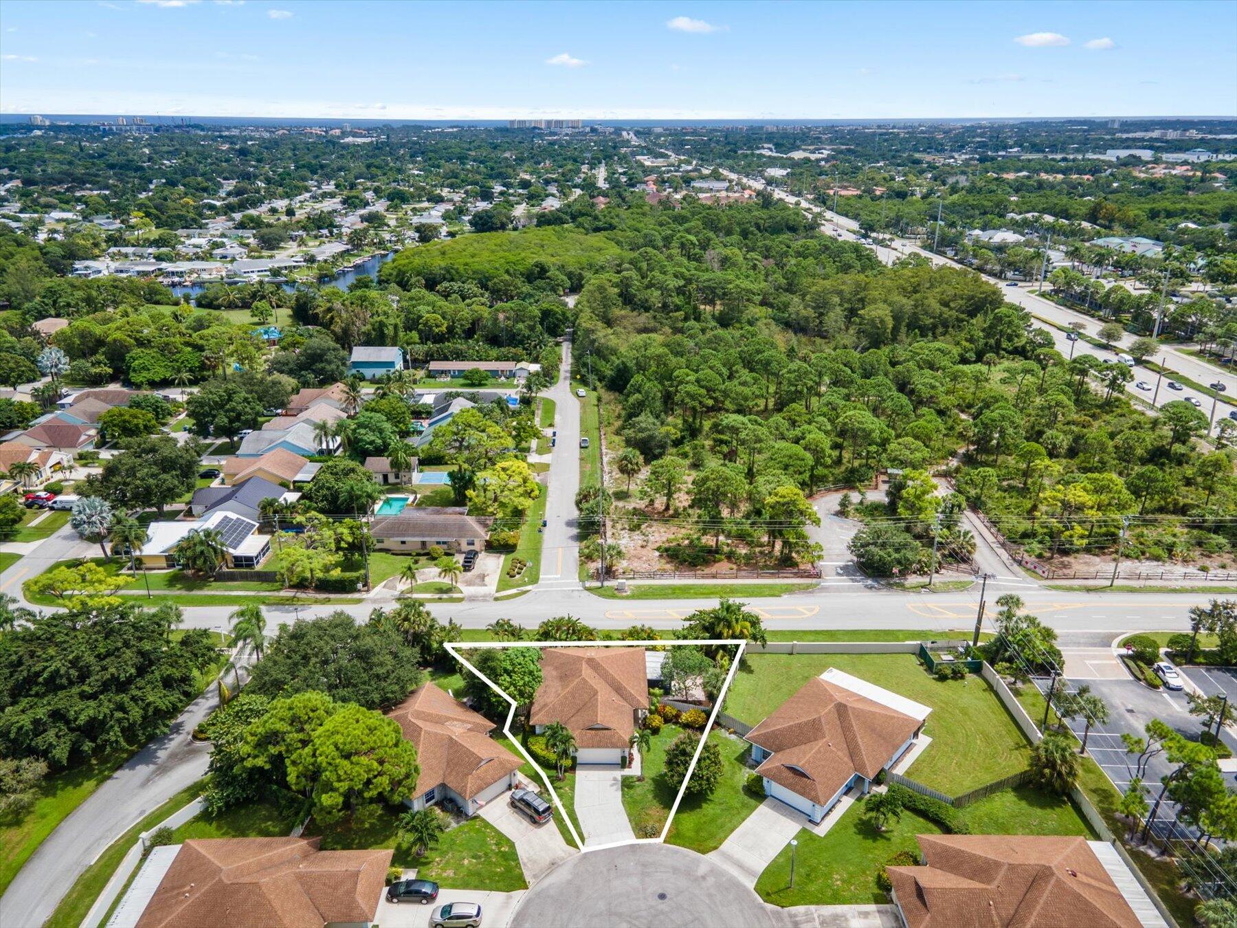 an aerial view of a house with a outdoor space