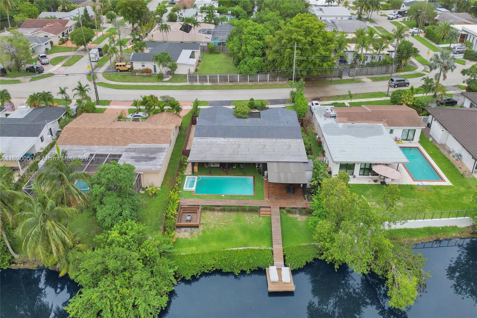 an aerial view of a house with a garden