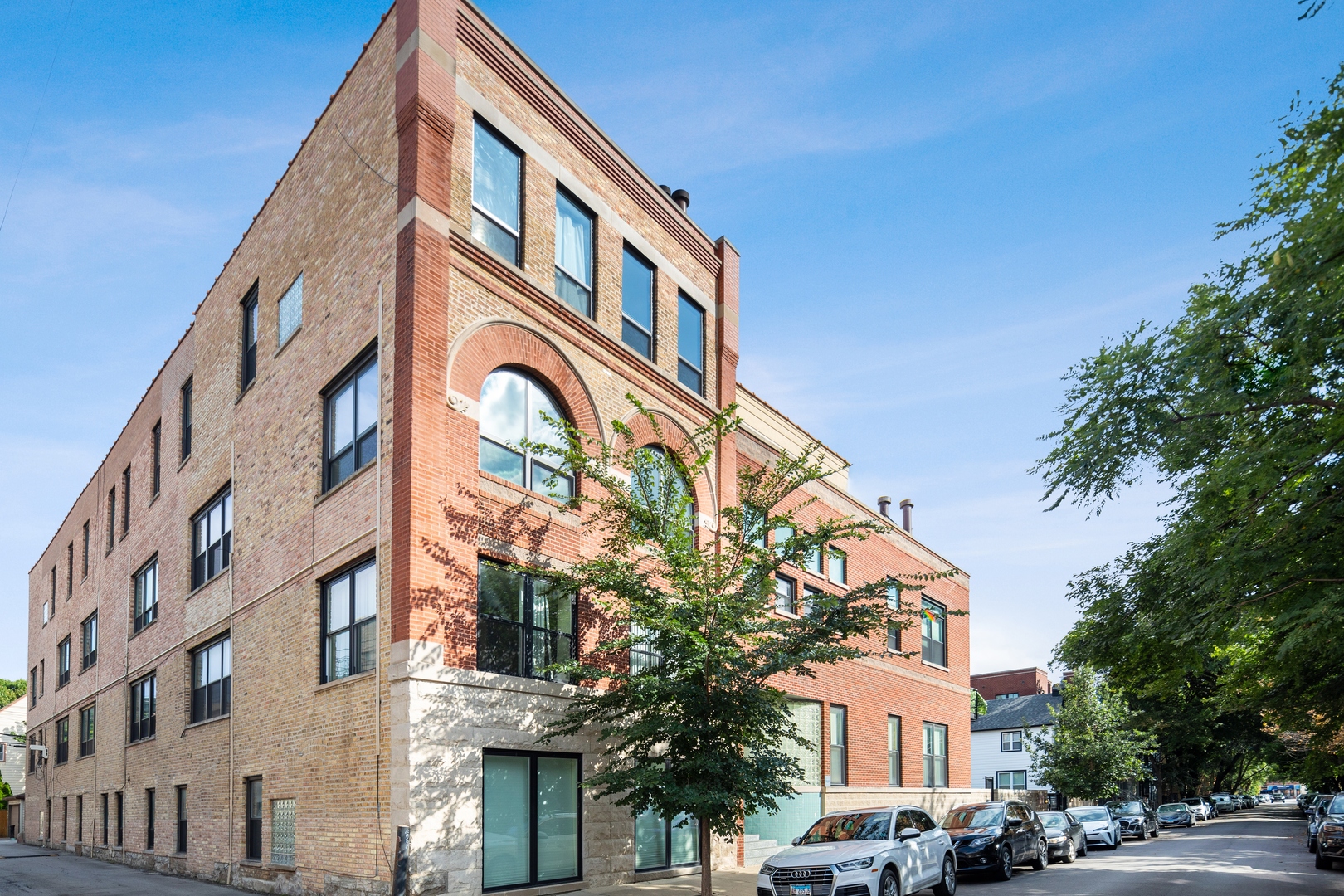 a view of a building with a street