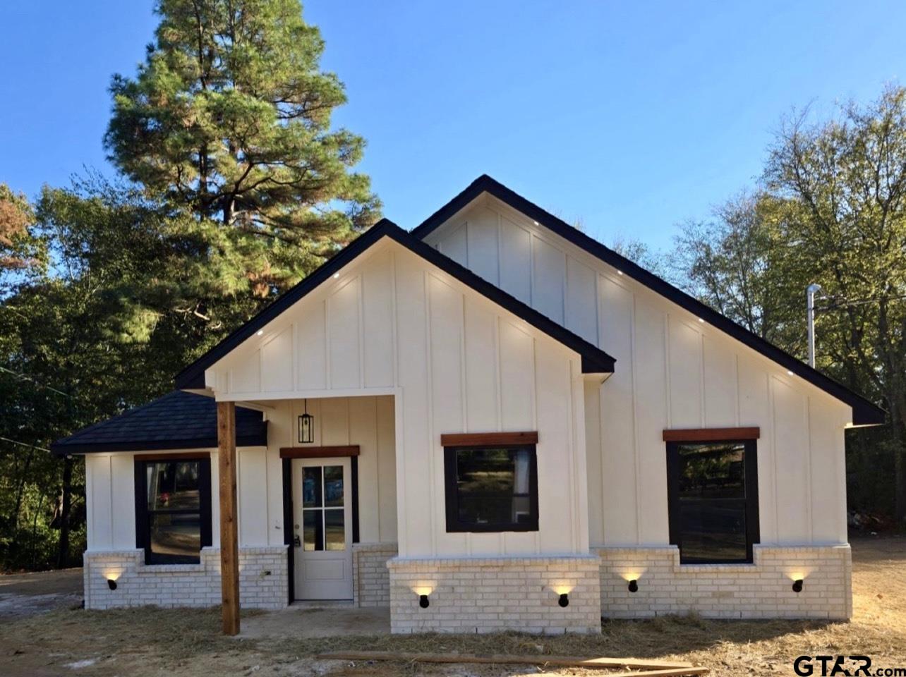 a front view of a house with windows