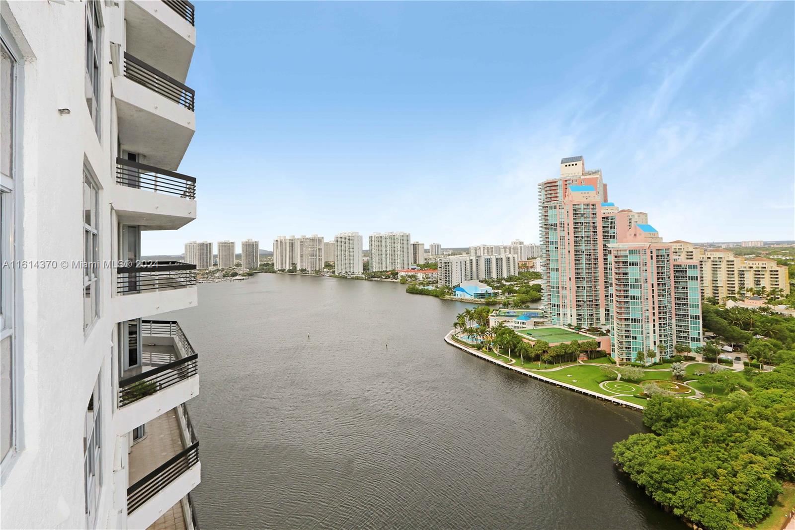 a view of balcony with city and ocean view