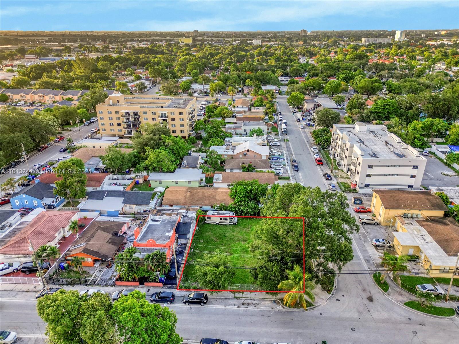 an aerial view of a city with lots of residential buildings