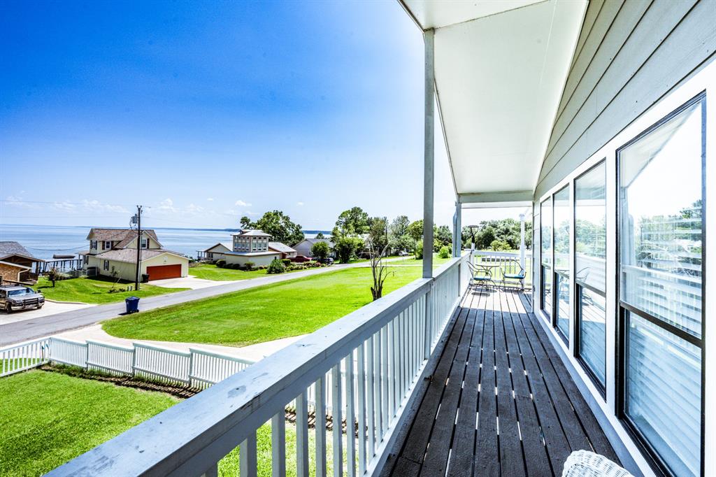 a view of swimming pool from a balcony