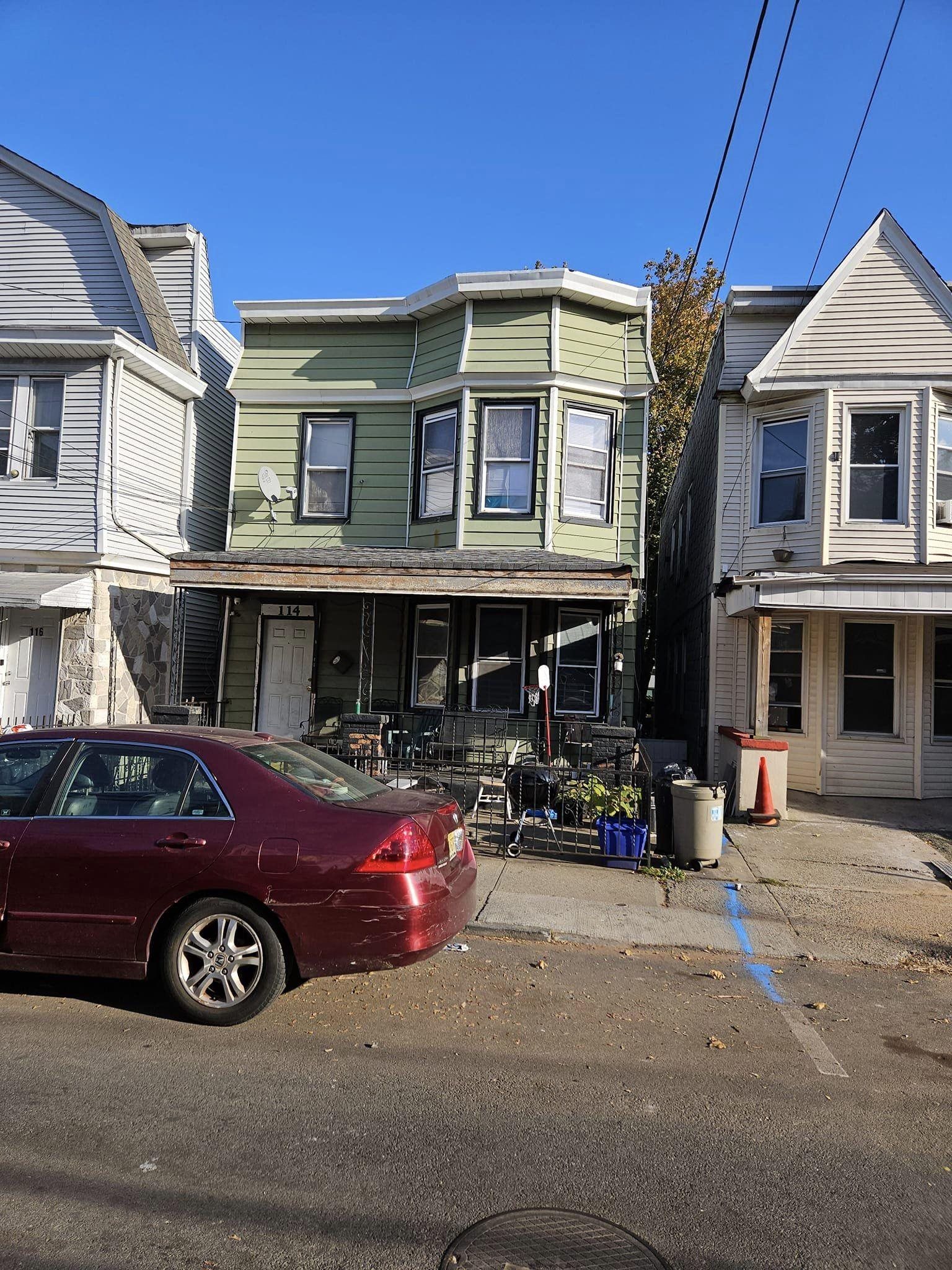 a car parked in front of a house