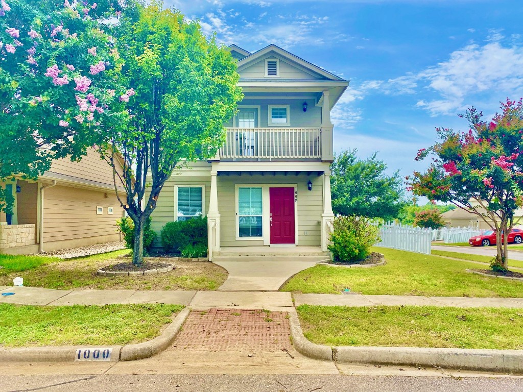 a front view of house with yard