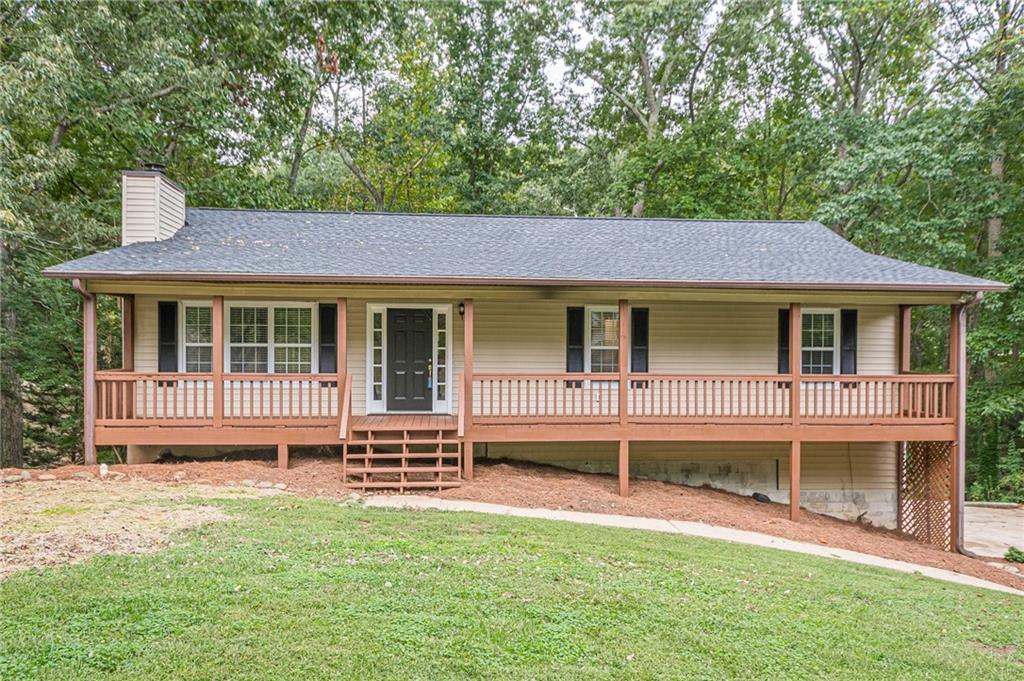 front view of a house with a yard