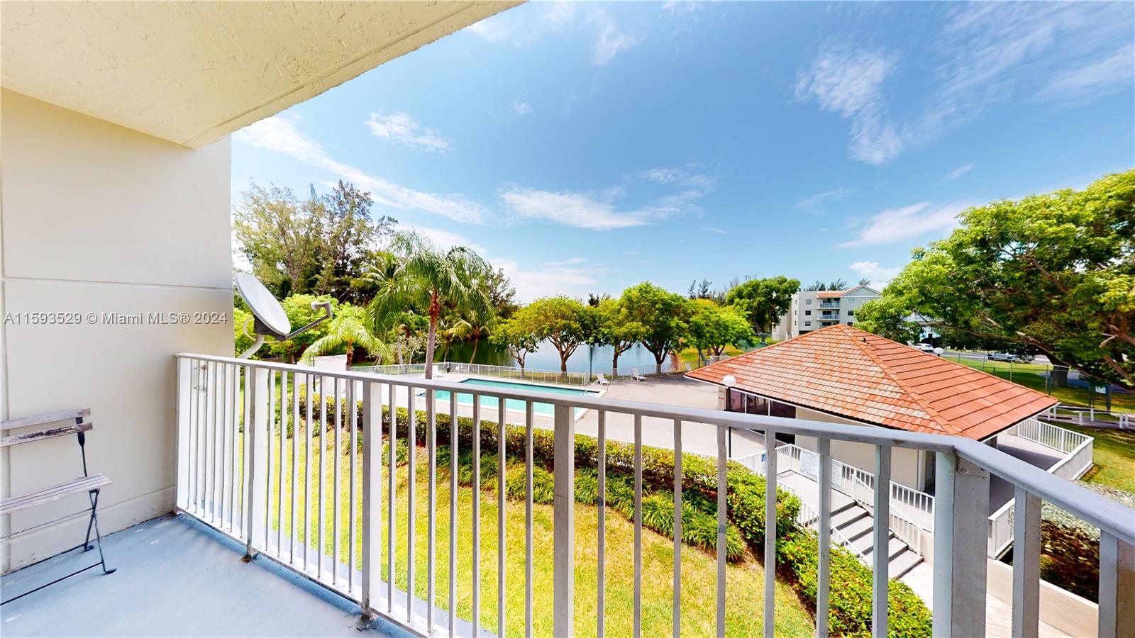 a view of a balcony with wooden floor