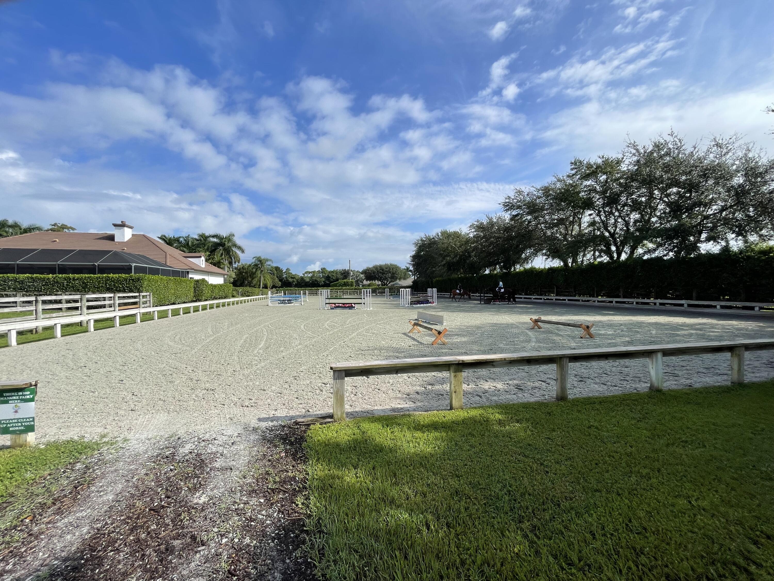 a view of a lake with houses in the background