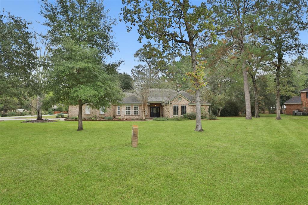 a house with trees in the background